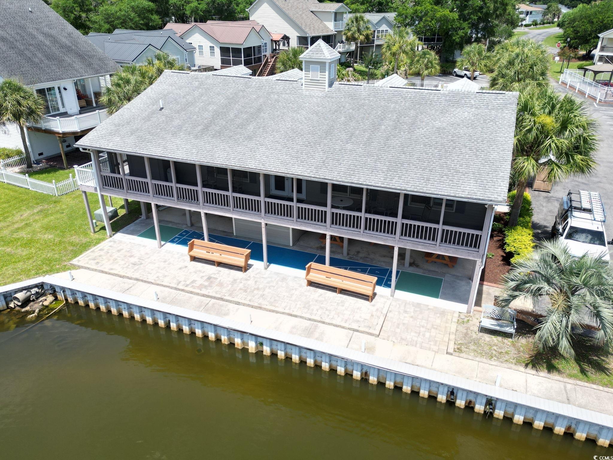 914 Dock Place Murrells Inlet, SC 29576 - Photo 30 of 37 Rear view of property with a patio, roof with shingles, and a water view