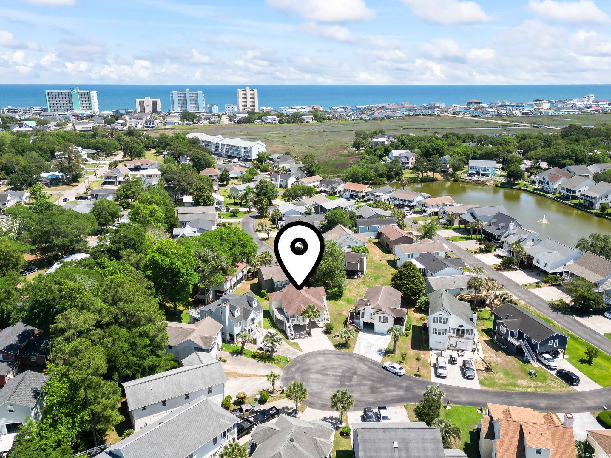 914 Dock Place Murrells Inlet, SC 29576 - Photo 9 of 37 Aerial perspective of suburban area with a nearby body of water