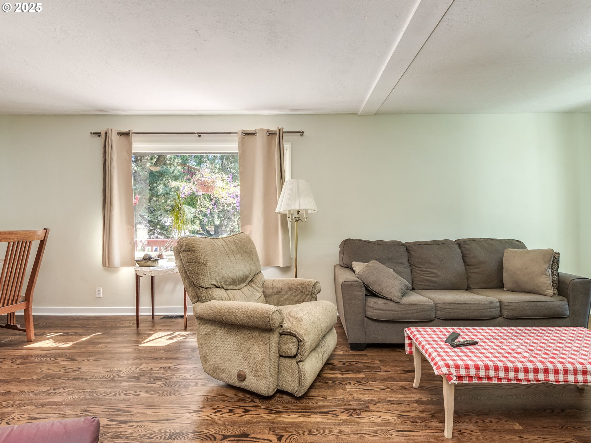 4731 Northeast 106th Avenue Portland, OR 97220 - Photo 11 of 44 a living room with furniture and a window