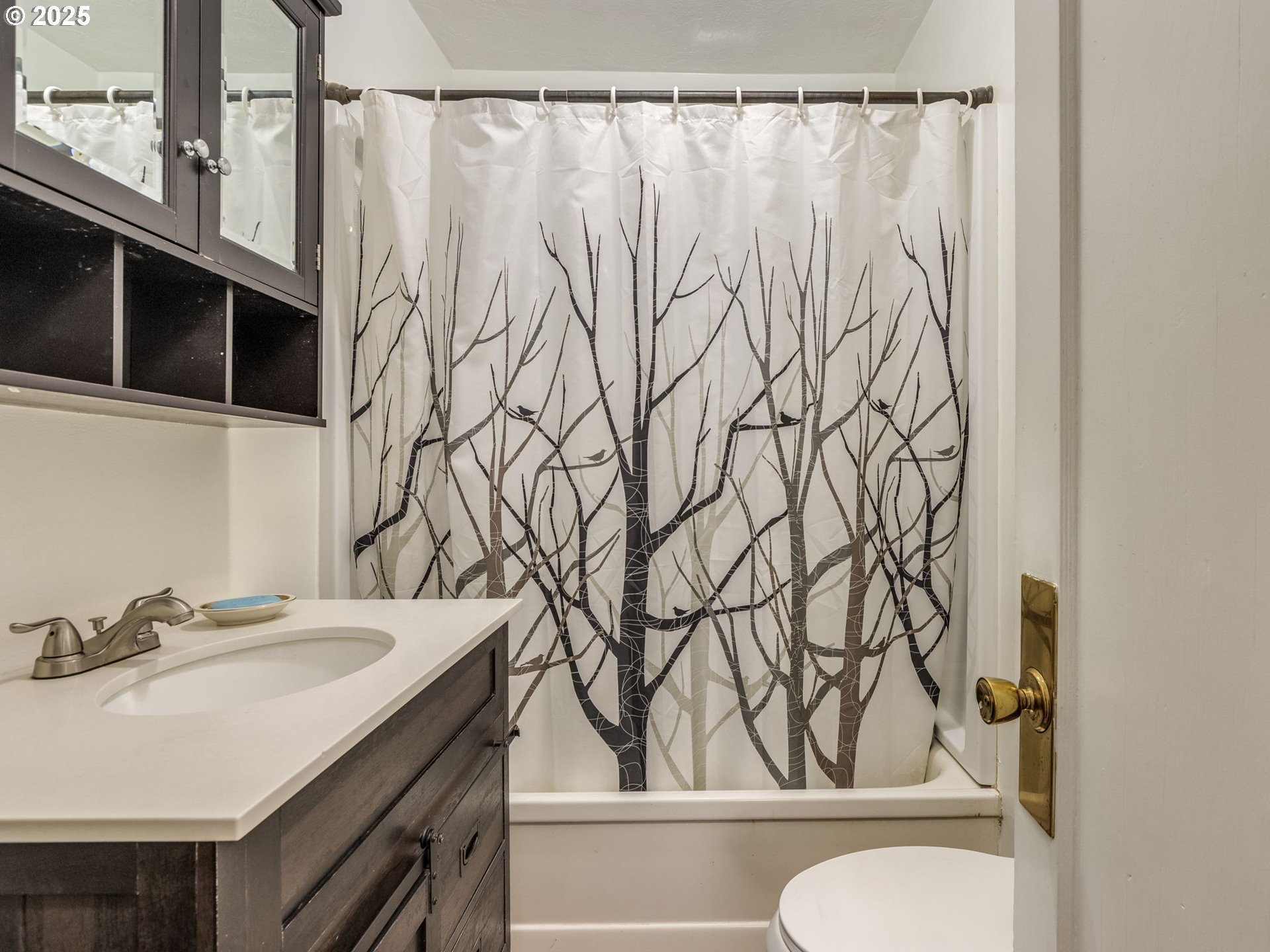 4731 Northeast 106th Avenue Portland, OR 97220 - Photo 16 of 44 a bathroom with a sink and a mirror
