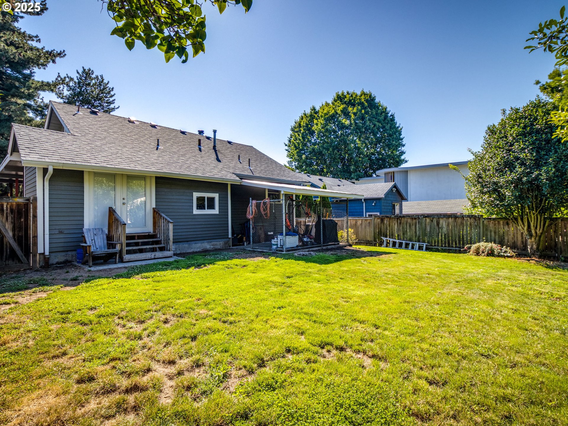4731 Northeast 106th Avenue Portland, OR 97220 - Photo 36 of 44 a view of a house with swimming pool patio and a yard