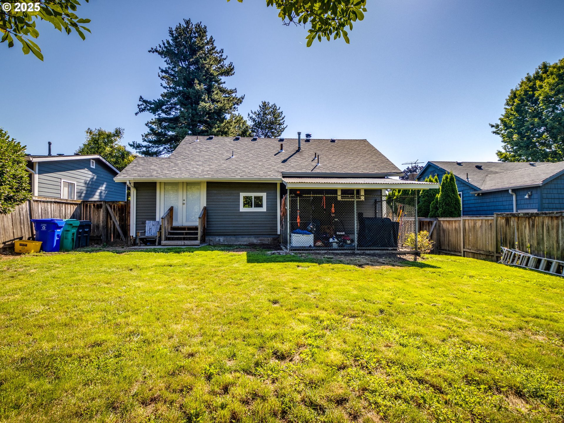 4731 Northeast 106th Avenue Portland, OR 97220 - Photo 37 of 44 a front view of a house with swimming pool