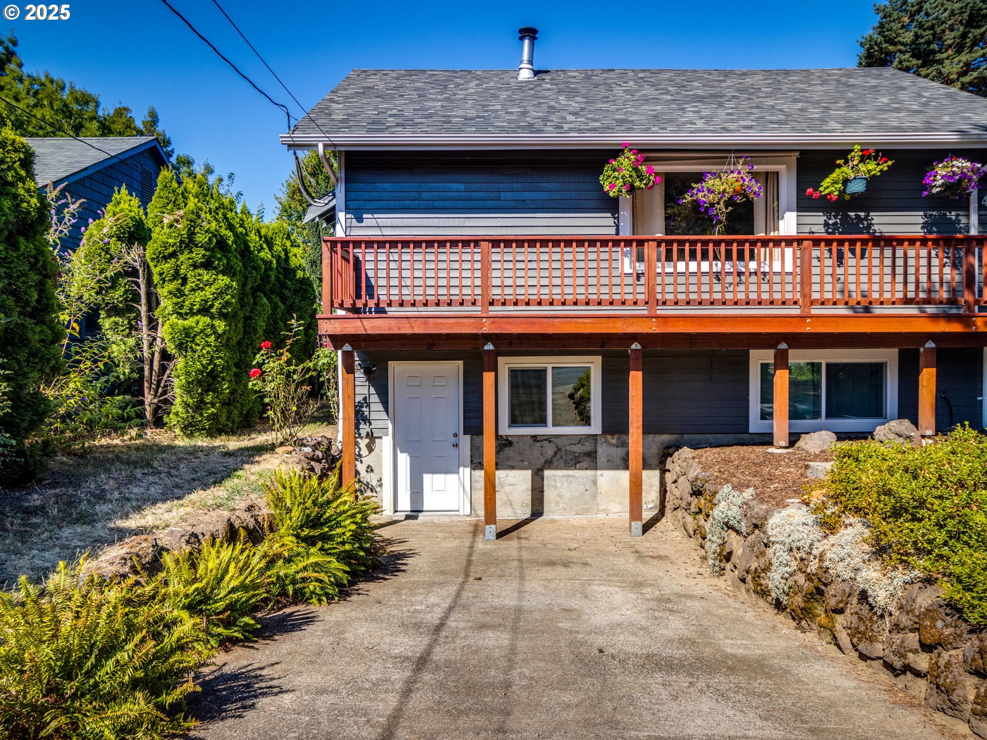 4731 Northeast 106th Avenue Portland, OR 97220 - Photo 43 of 44 a front view of a house with a porch