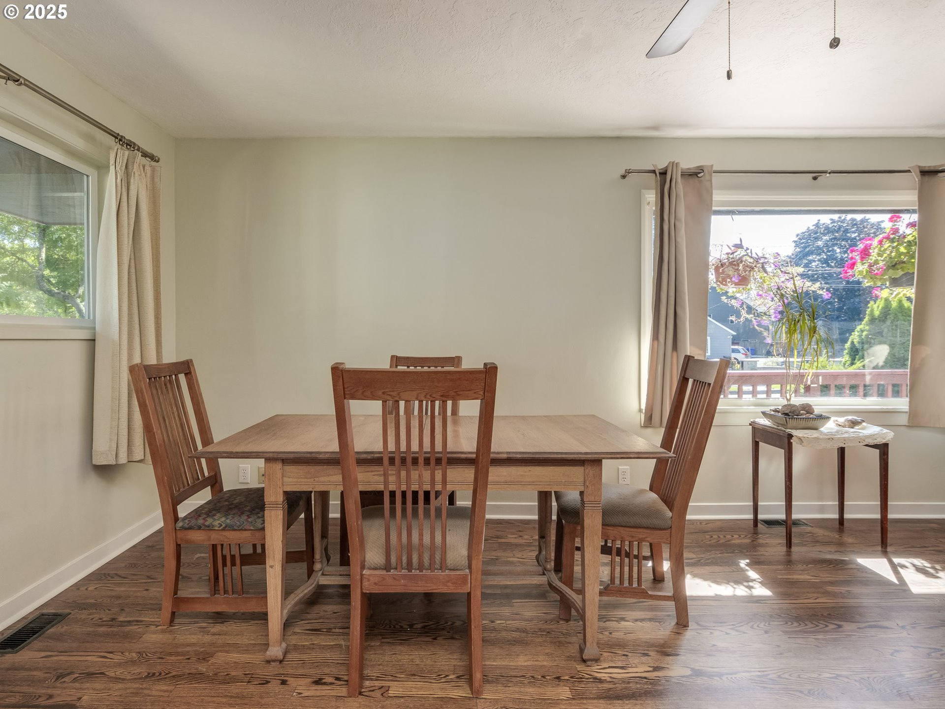 4731 Northeast 106th Avenue Portland, OR 97220 - Photo 7 of 44 a view of a dining room with furniture window and wooden floor