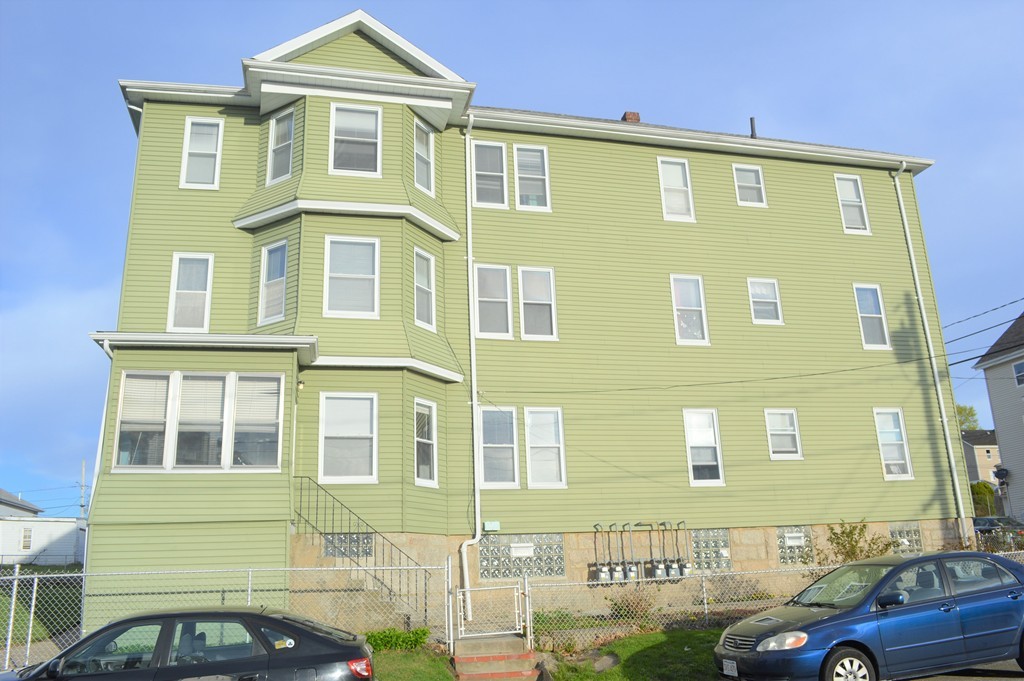 225 Baker Street Fall River, MA 02721 - Photo 1 of 5 a front view of a residential apartment building