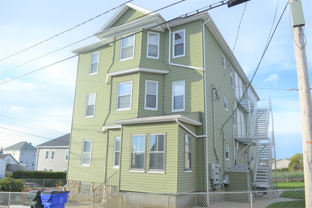 225 Baker Street Fall River, MA 02721 - Photo 2 of 5 a front view of a multi story building