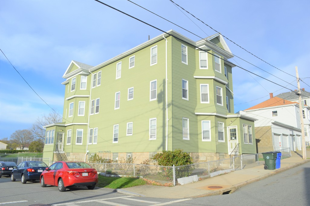 225 Baker Street Fall River, MA 02721 - Photo 3 of 5 a front view of a building with street view