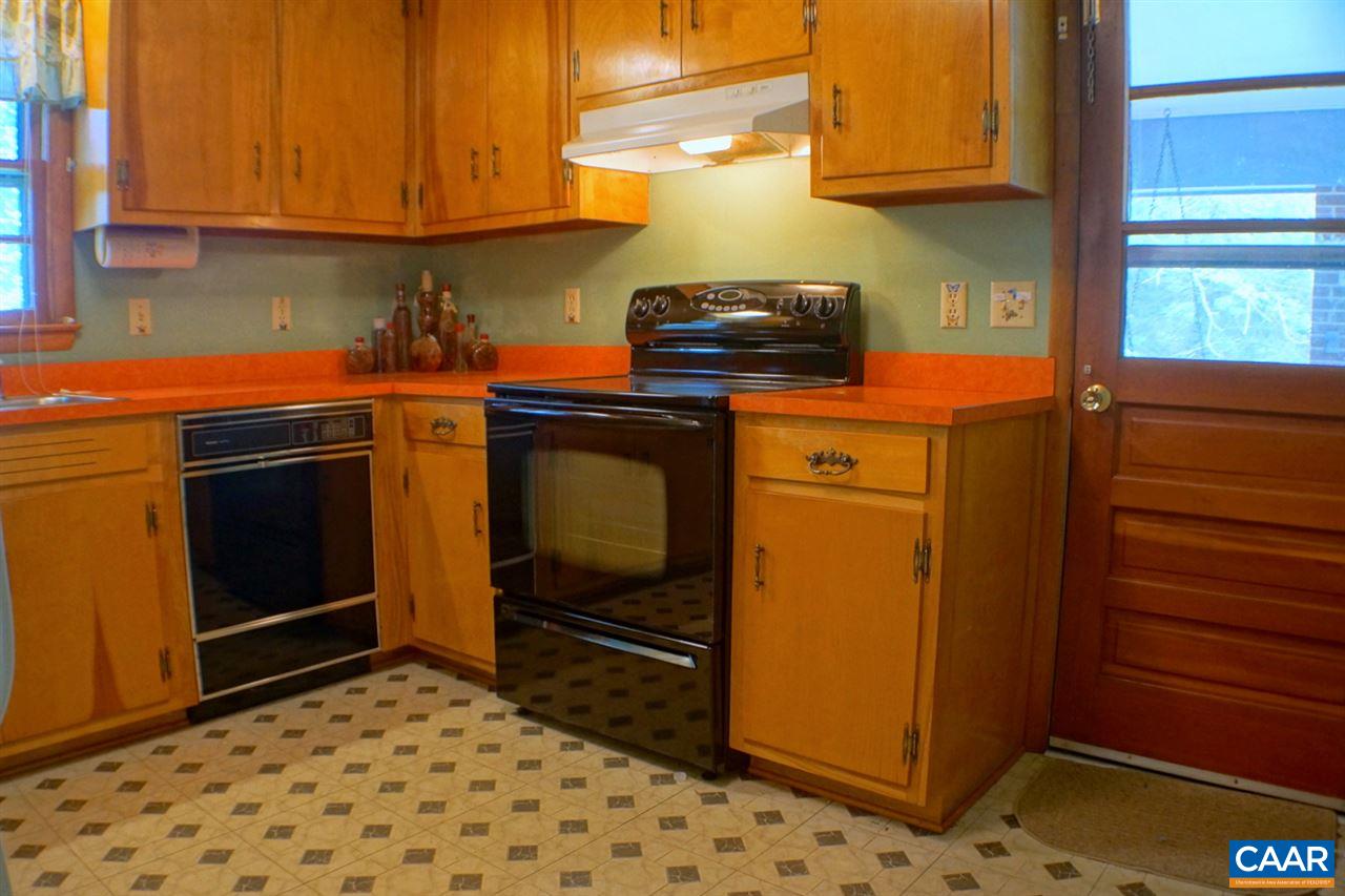 2000 Orange Road Pratts, VA 22731 - Photo 11 of 38 a kitchen with a stove and a refrigerator