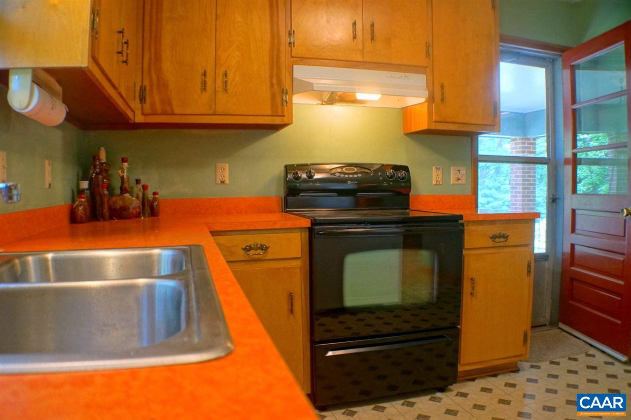 2000 Orange Road Pratts, VA 22731 - Photo 12 of 38 a kitchen with a sink and a stove