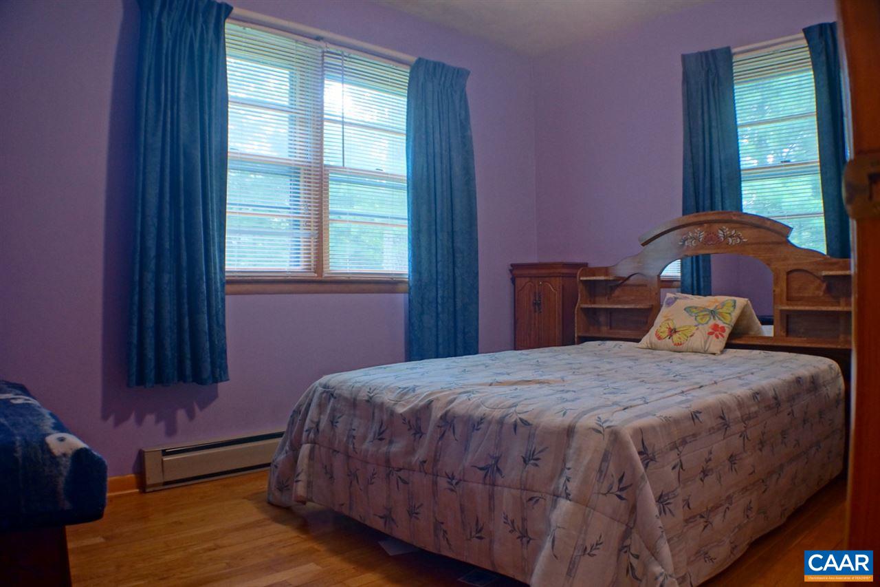 2000 Orange Road Pratts, VA 22731 - Photo 18 of 38 a bedroom with a bed and a window