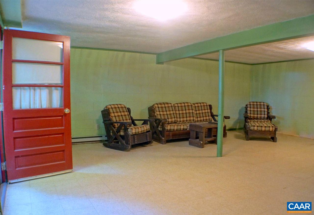 2000 Orange Road Pratts, VA 22731 - Photo 26 of 38 a living room with furniture and a dresser