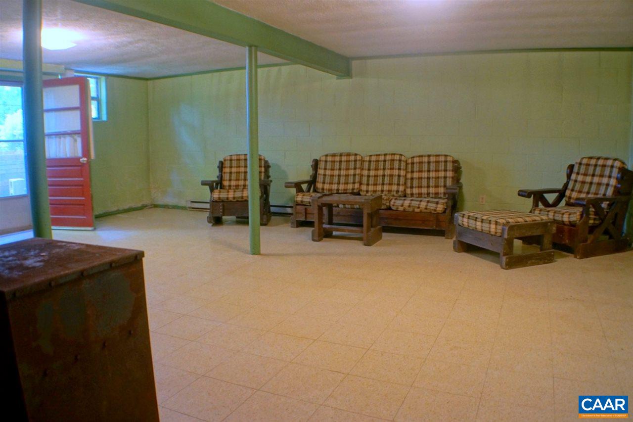 2000 Orange Road Pratts, VA 22731 - Photo 32 of 38 a room with chair and a table