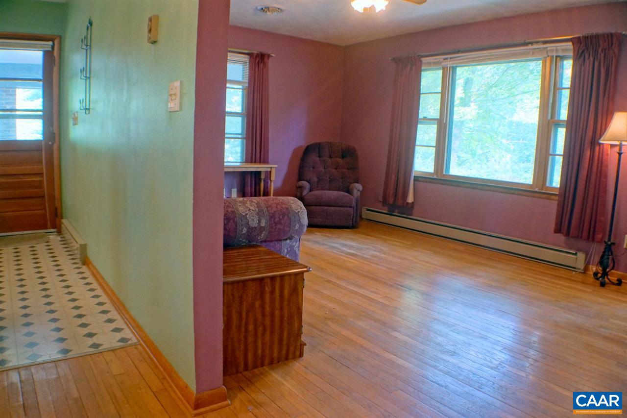 2000 Orange Road Pratts, VA 22731 - Photo 5 of 38 a room with furniture and wooden floor