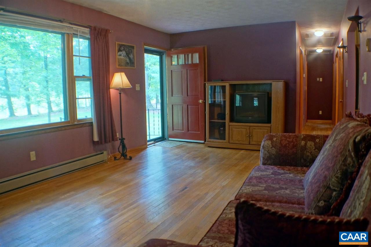 2000 Orange Road Pratts, VA 22731 - Photo 7 of 38 a living room with furniture and a window