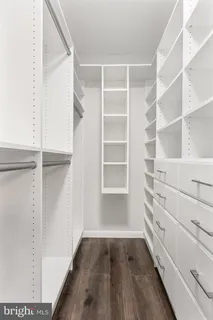a view of an empty walk in closet