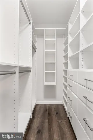 a view of an empty walk in closet