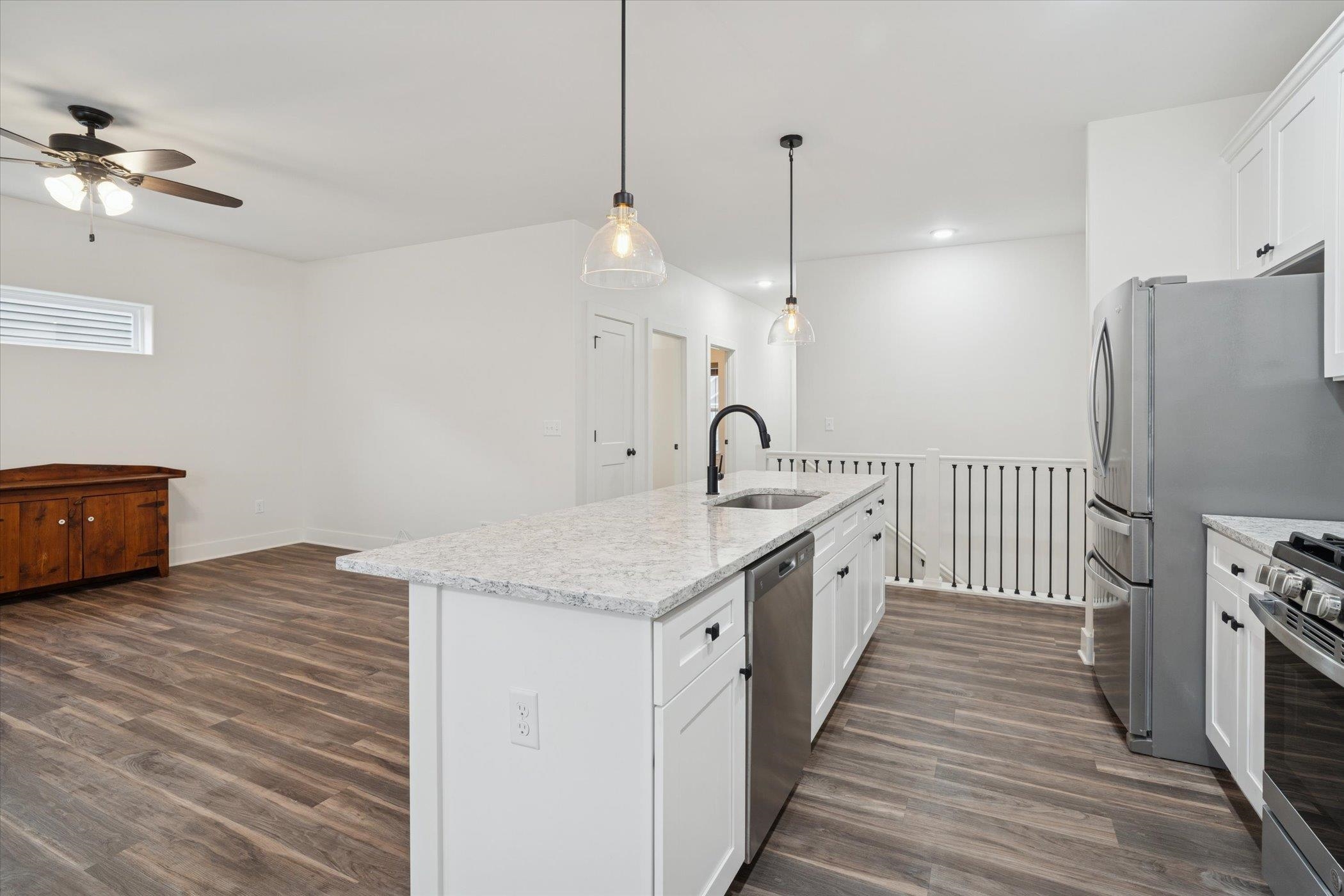505 Anjali Court Sycamore, IL 60178 - Photo 18 of 47 a kitchen with stainless steel appliances granite countertop a sink stove and refrigerator