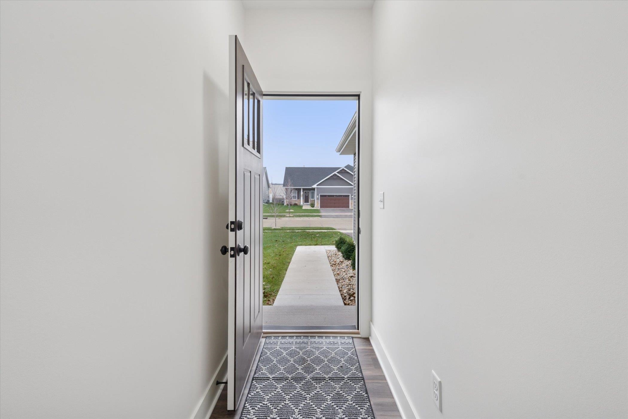 505 Anjali Court Sycamore, IL 60178 - Photo 28 of 47 a view of hallway with wooden floor