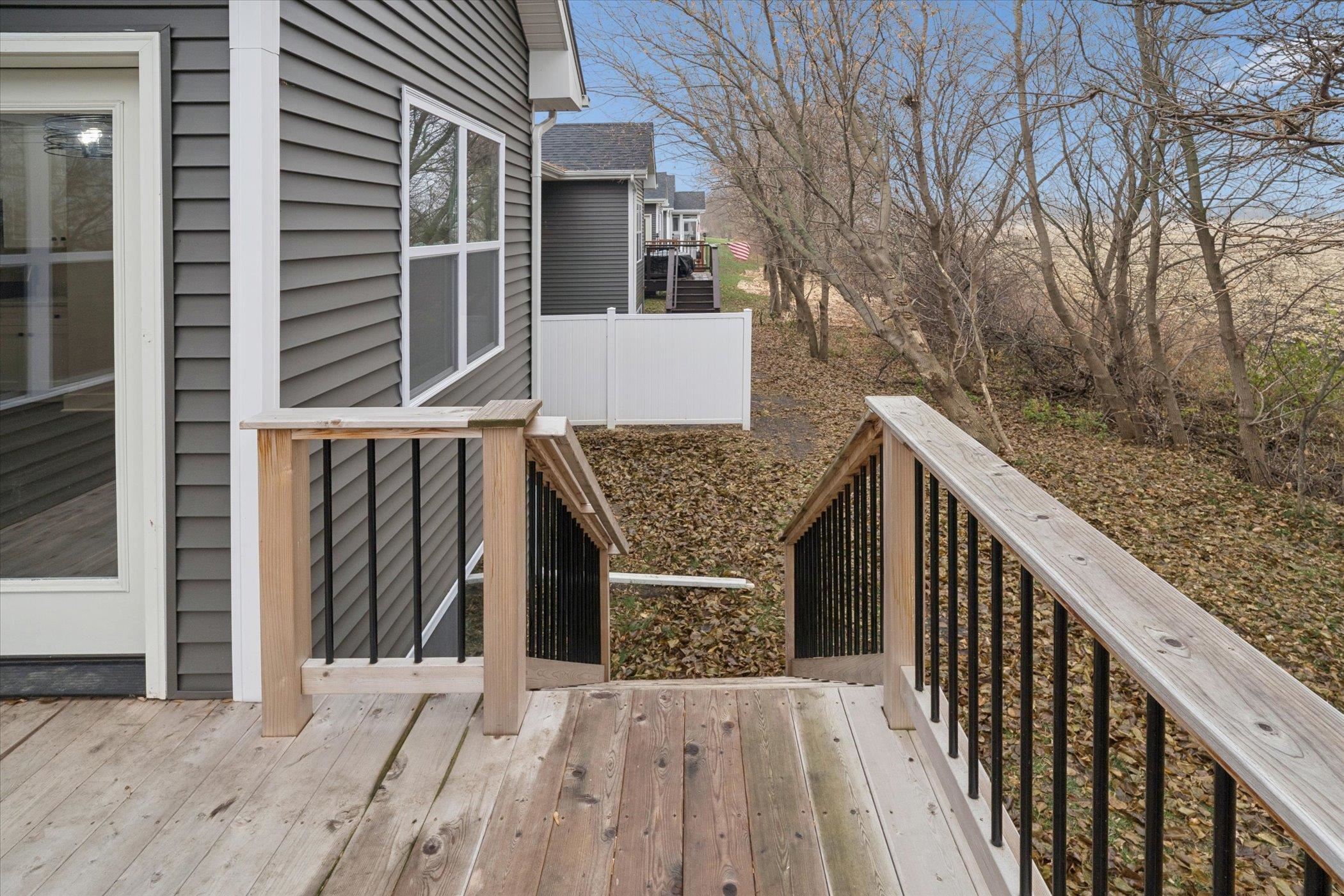 505 Anjali Court Sycamore, IL 60178 - Photo 3 of 47 a balcony view with wooden floor and electric fence