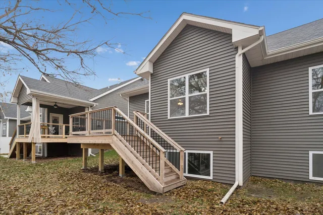 a balcony view with wooden floor and electric fence