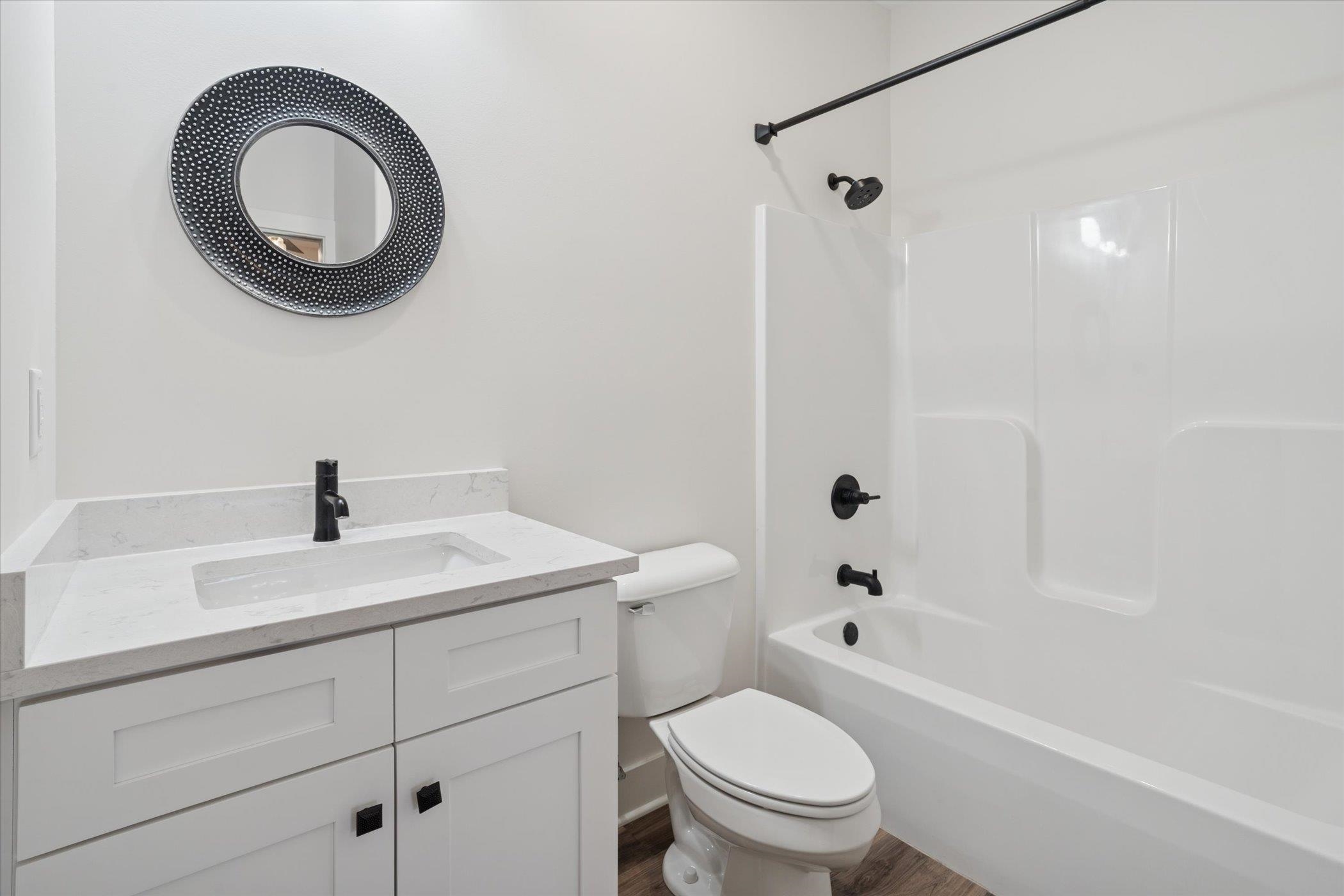 505 Anjali Court Sycamore, IL 60178 - Photo 40 of 47 a bathroom with a sink a toilet and a mirror
