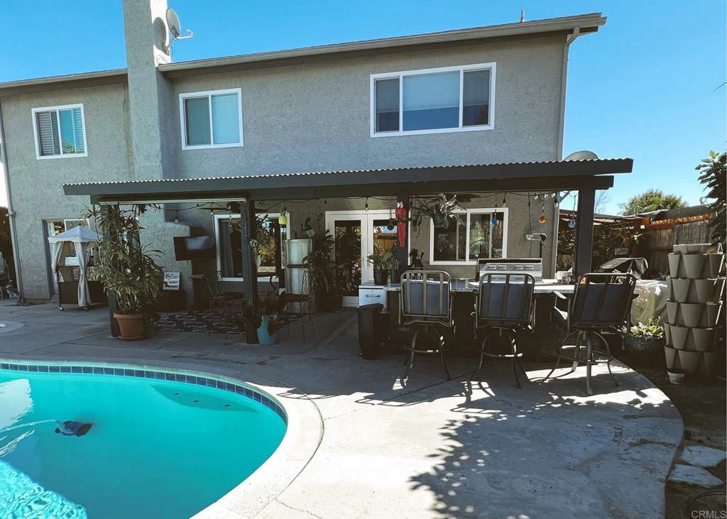 3583 Hatfield Circle Oceanside, CA 92056 - Photo 20 of 32 a swimming pool view with a outdoor seating