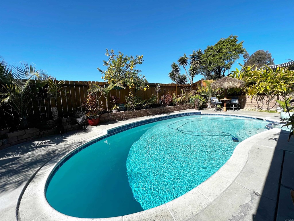 3583 Hatfield Circle Oceanside, CA 92056 - Photo 21 of 32 a view of a swimming pool with a garden