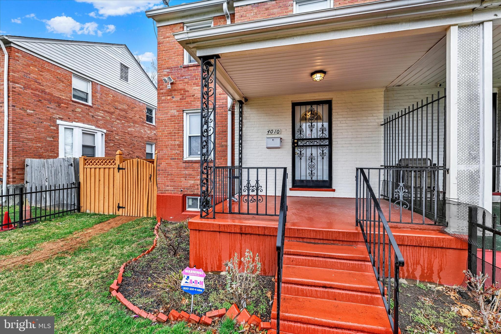 4010 Brookhill Road Baltimore, MD 21215 - Photo 4 of 26 a view of a house with a small yard