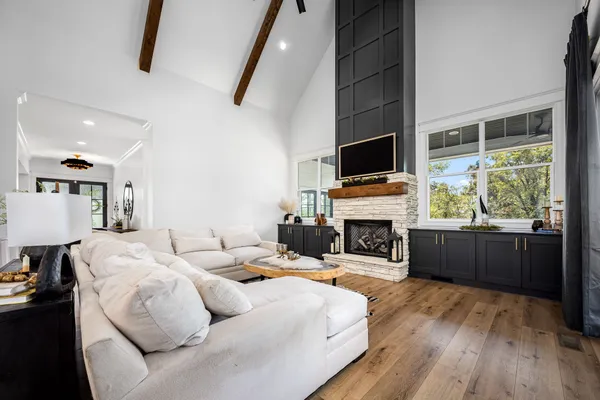 a kitchen with a stove cabinets and a refrigerator