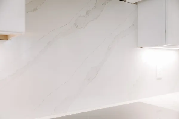 a living room with furniture fireplace and flat screen tv