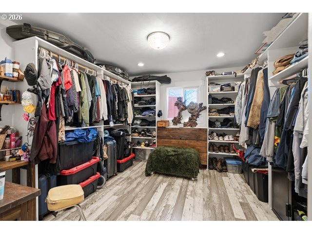 526 East Punkin Center Road Hermiston, OR 97838 - Photo 15 of 48 a view of walk in closet with clothes and shoes