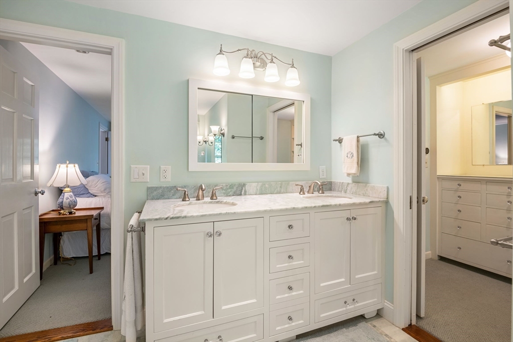21 Topsfield Road Boxford, MA 01921 - Photo 19 of 42 a en suite bathroom with a double vanity sink and a mirror
