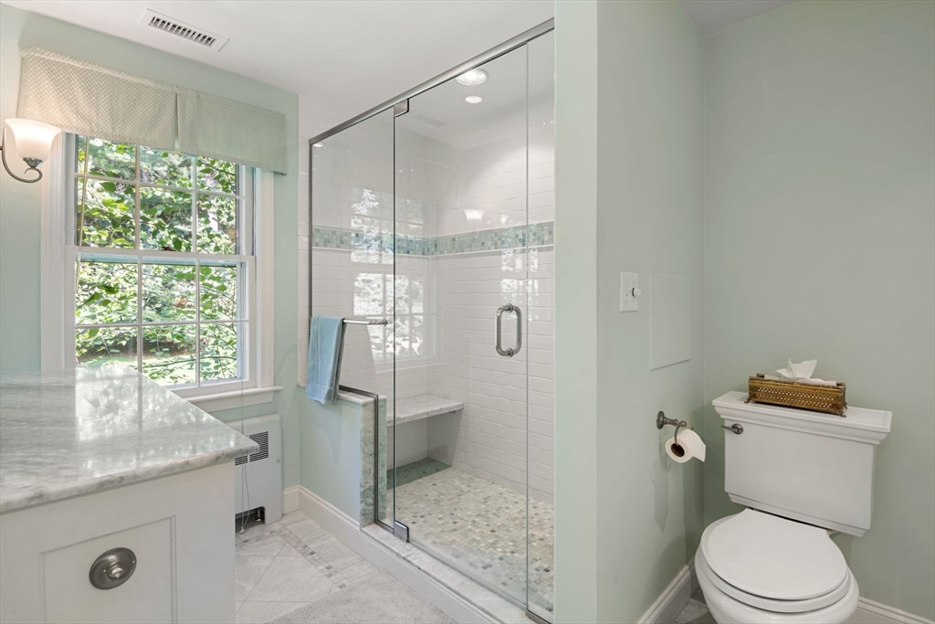 21 Topsfield Road Boxford, MA 01921 - Photo 20 of 42 a bathroom with a granite countertop sink a toilet and shower