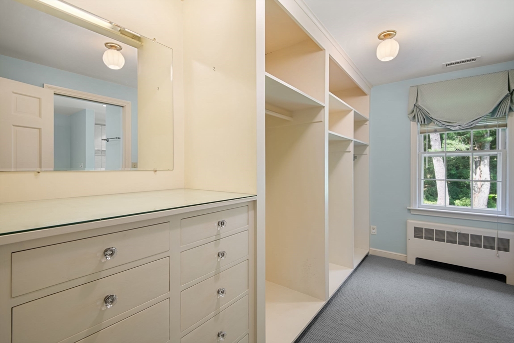 21 Topsfield Road Boxford, MA 01921 - Photo 21 of 42 a bathroom with a window and a mirror