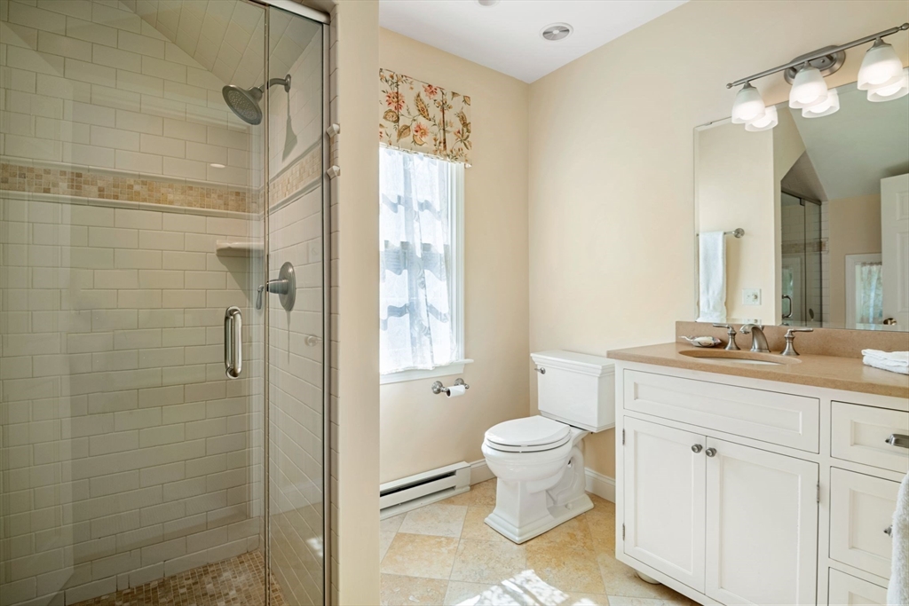 21 Topsfield Road Boxford, MA 01921 - Photo 24 of 42 a bathroom with a granite countertop sink toilet and shower