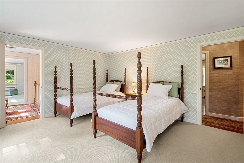 21 Topsfield Road Boxford, MA 01921 - Photo 25 of 42 a bed room with a bed and a chair