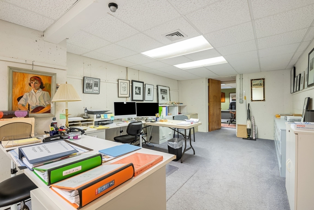 21 Topsfield Road Boxford, MA 01921 - Photo 37 of 42 a living room with furniture a window and a table