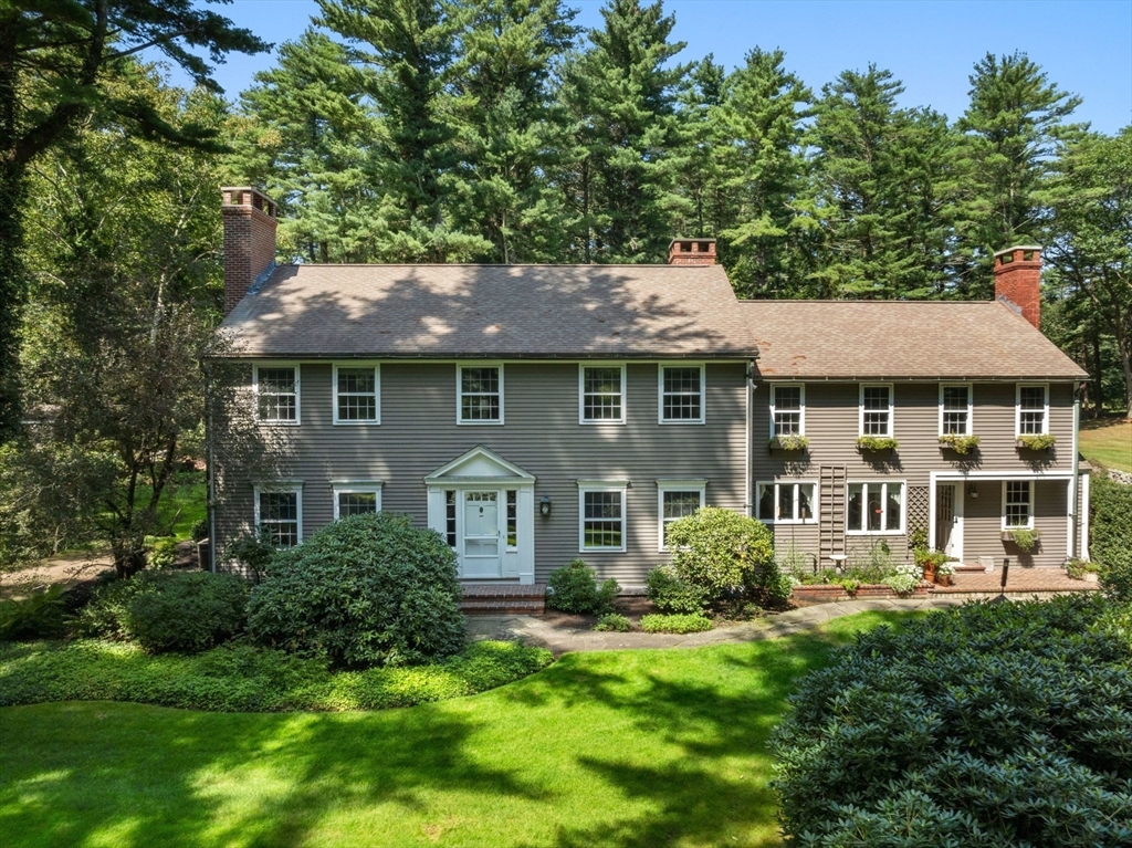 21 Topsfield Road Boxford, MA 01921 - Photo 4 of 42 a front view of a house with a yard
