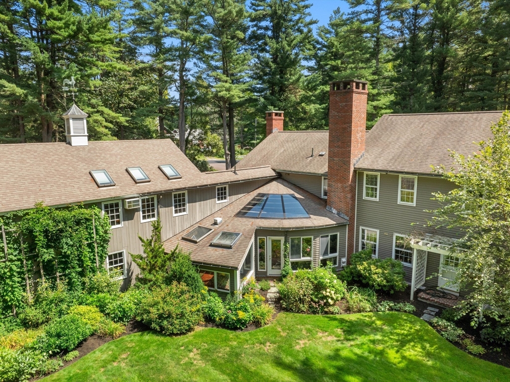 21 Topsfield Road Boxford, MA 01921 - Photo 5 of 42 a front view of a house with a yard