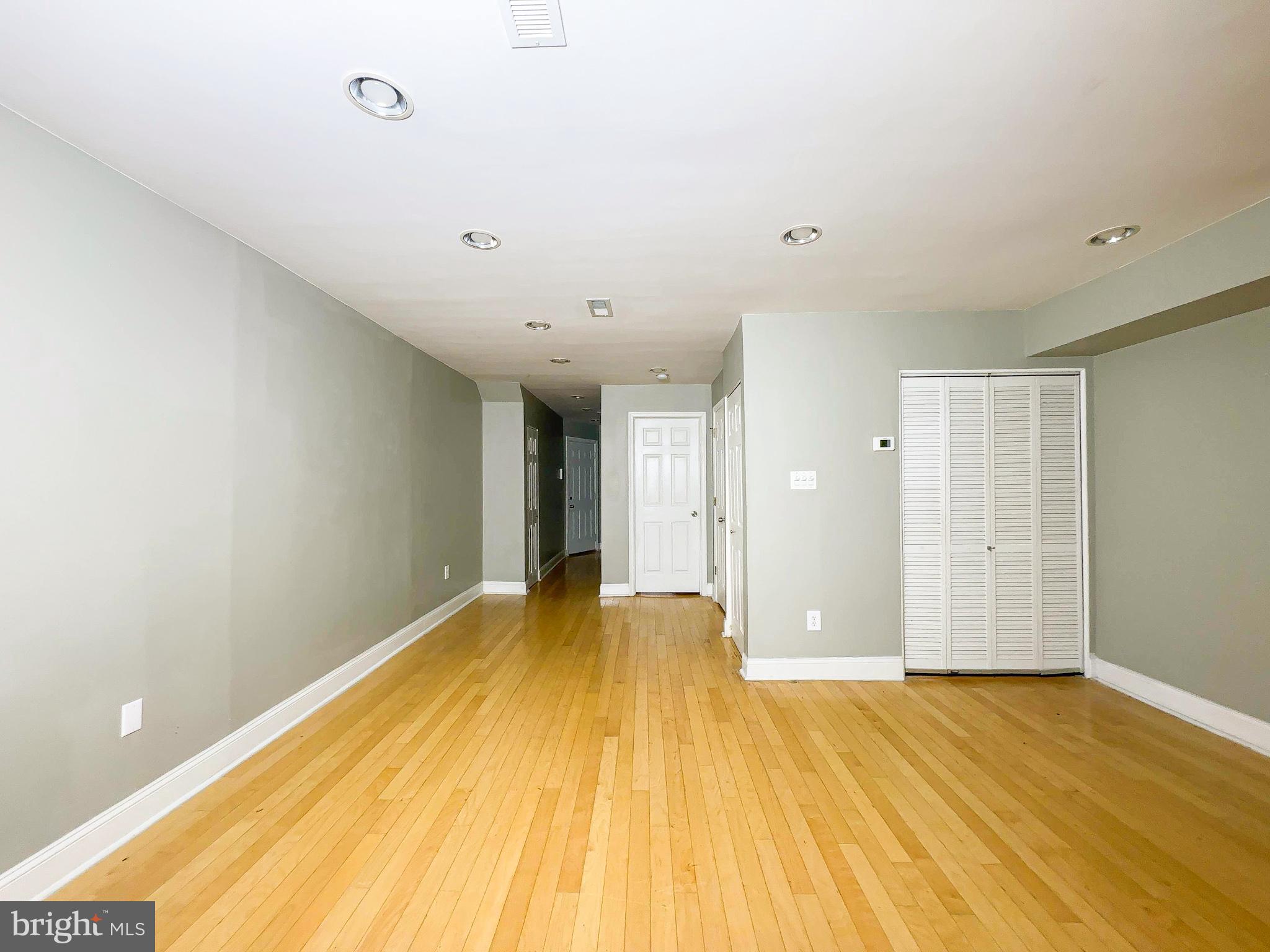 1835 D Street Northeast Washington, DC 20002 - Photo 12 of 42 a view of empty room with wooden floor