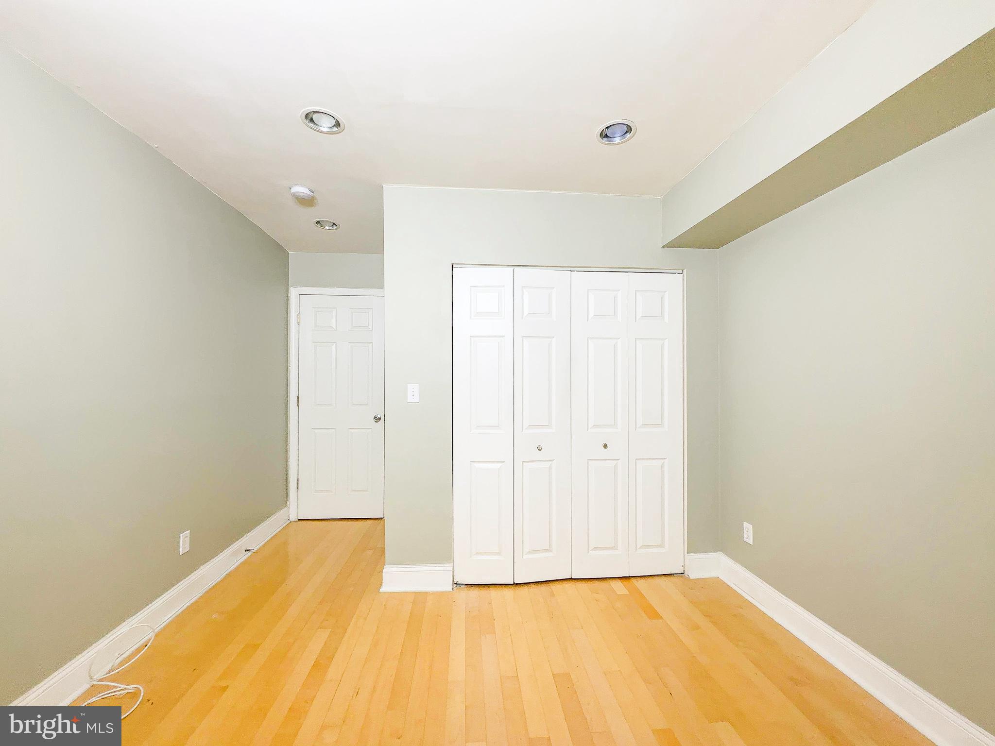 1835 D Street Northeast Washington, DC 20002 - Photo 23 of 42 a view of a room with a wooden floor