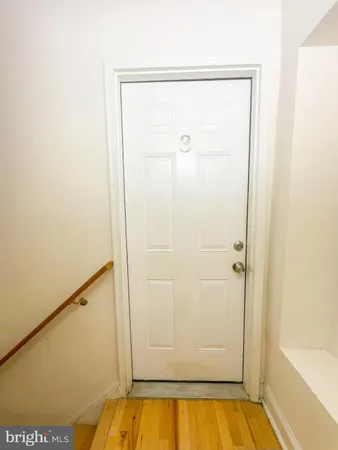 a view of a bathtub in a hallway