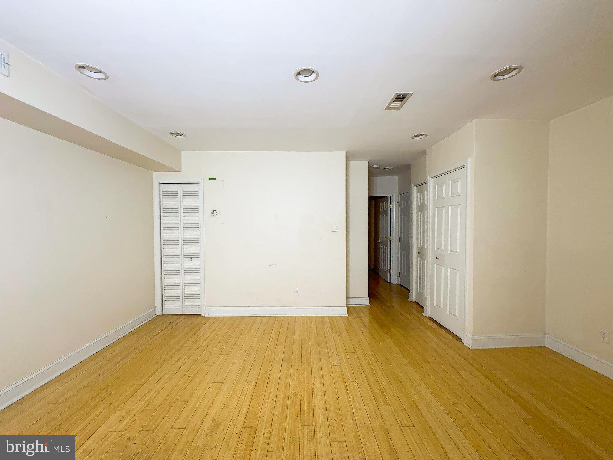 1835 D Street Northeast Washington, DC 20002 - Photo 40 of 42 a view of a room with wooden floor