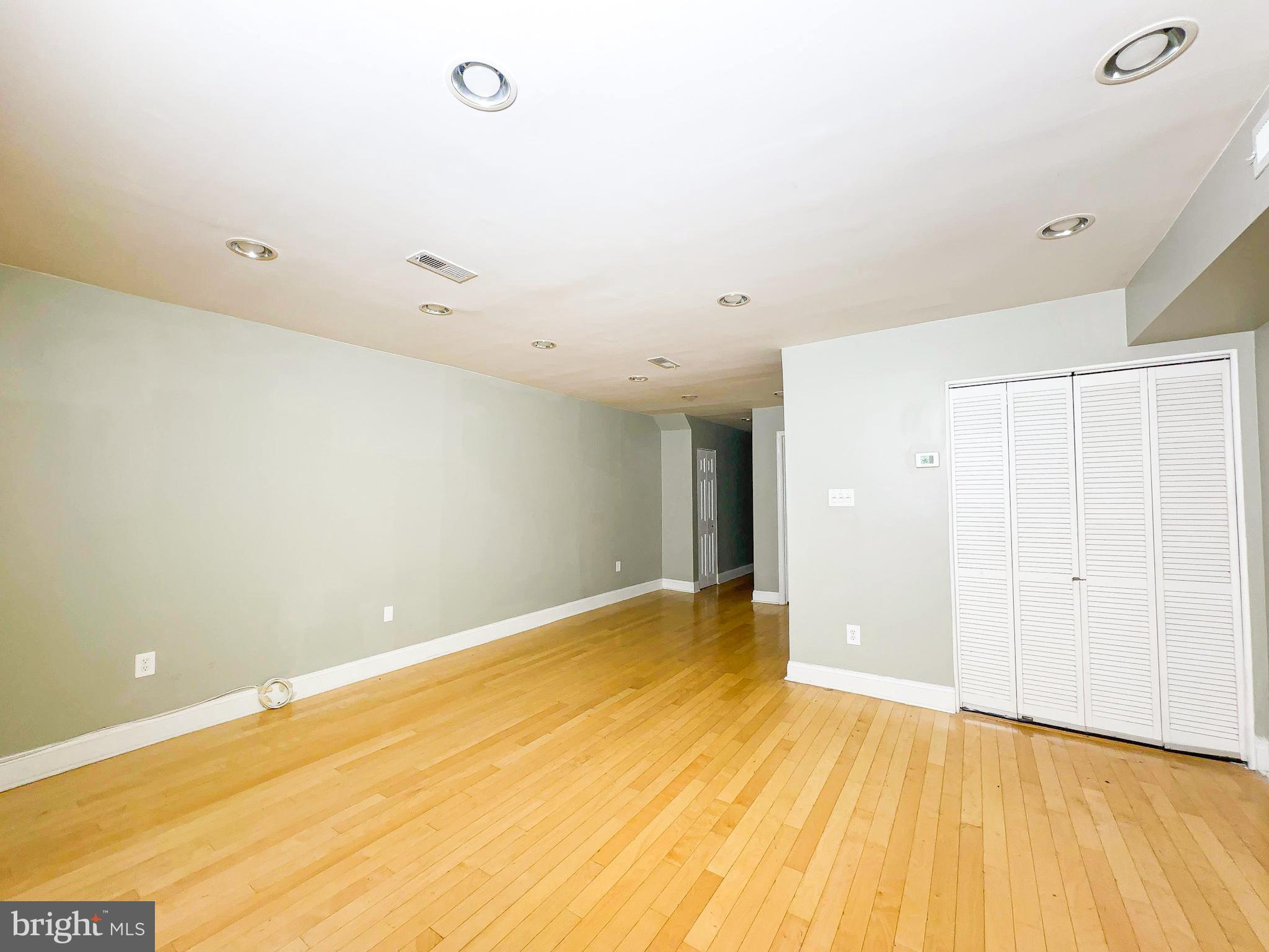 1835 D Street Northeast Washington, DC 20002 - Photo 4 of 42 a view of a room with wooden floor