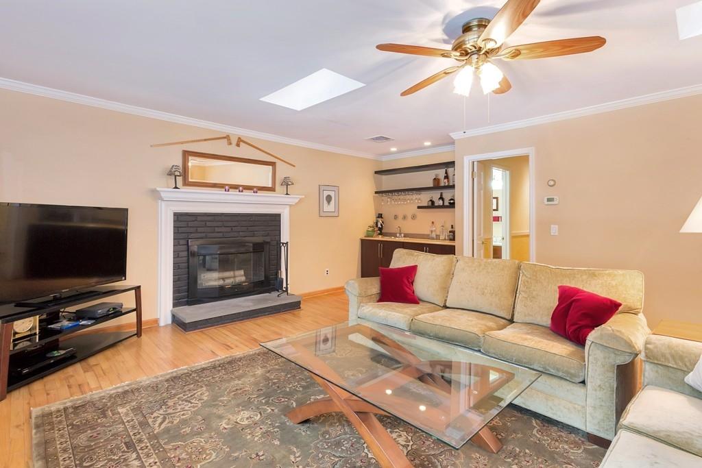 5 Country Club Road Darien, CT 06820 - Photo 11 of 20 a living room with furniture and a flat screen tv
