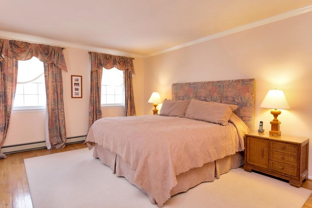 5 Country Club Road Darien, CT 06820 - Photo 13 of 20 a bedroom with a bed and window