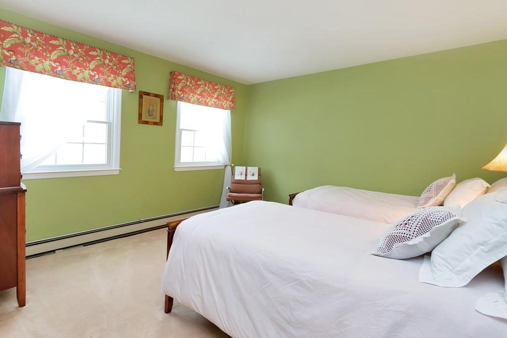 5 Country Club Road Darien, CT 06820 - Photo 17 of 20 a bedroom with a bed and a window
