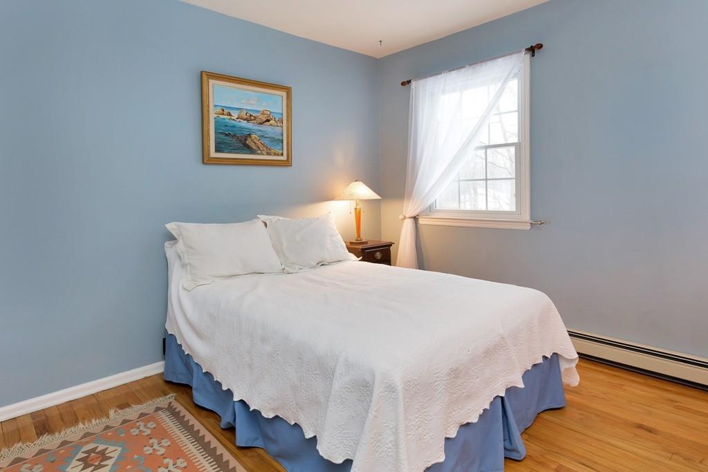 5 Country Club Road Darien, CT 06820 - Photo 18 of 20 a bedroom with bed and window