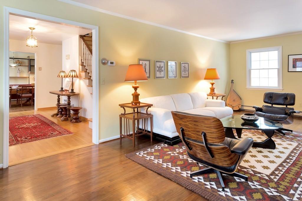 5 Country Club Road Darien, CT 06820 - Photo 4 of 20 a living room with dining room and wooden floor