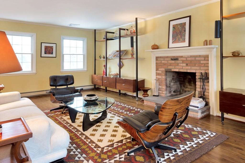 5 Country Club Road Darien, CT 06820 - Photo 5 of 20 a living room with furniture and a fireplace